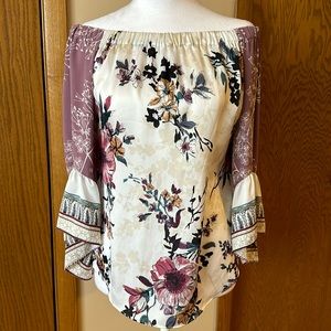 Set of two White House Black Market size small off-the-shoulder tops.